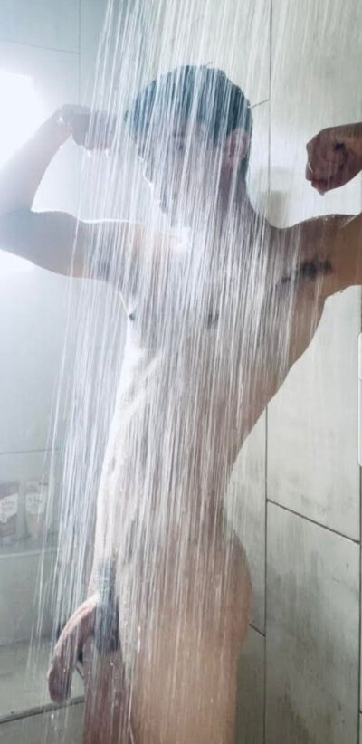 Flexing in the Shower with a Hanging Cock